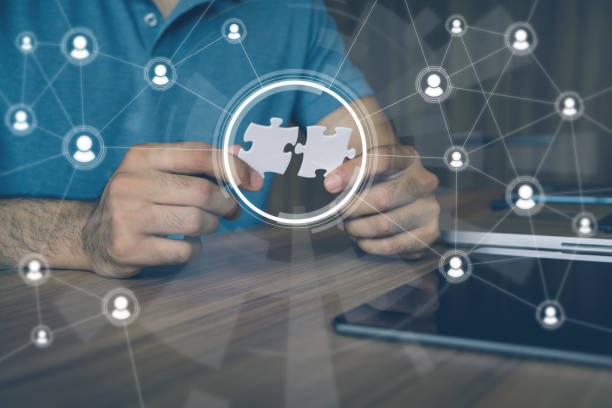 man holding pieces of jigsaw puzzle. business matching concept. crowd sourcing. freelancer. teleworking.