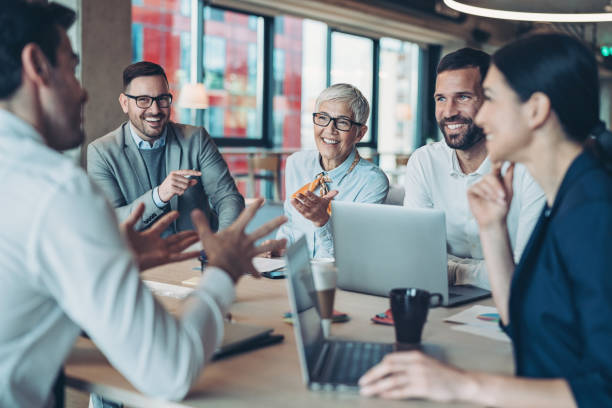 Group of business persons talking on a meeting